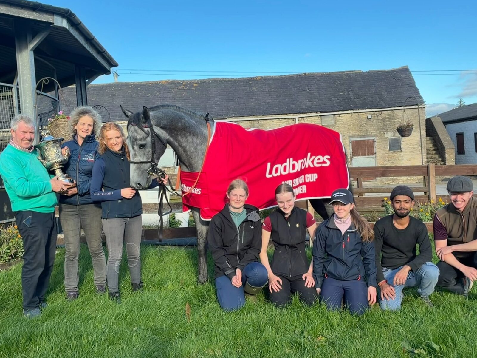 The Hambleton House yard team with Station X in the winner's rug after the Silver Cup at Ayr.