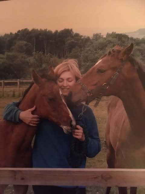 Susan Corbett with two horses
